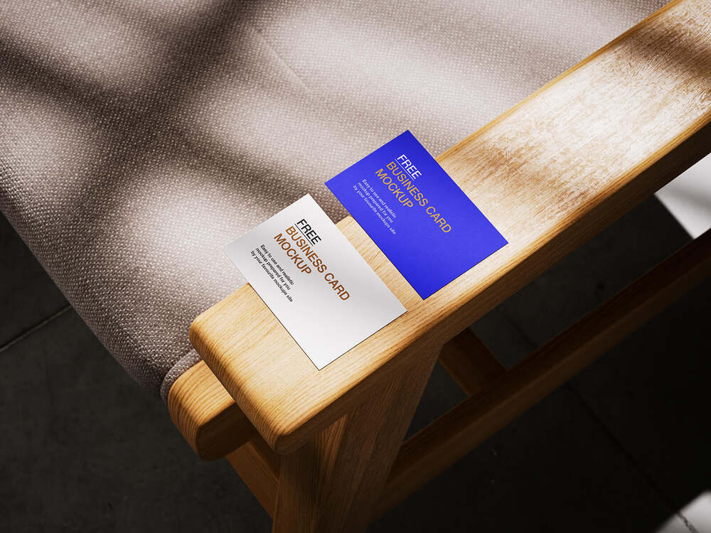 A free set of wooden armchair business card mockups
