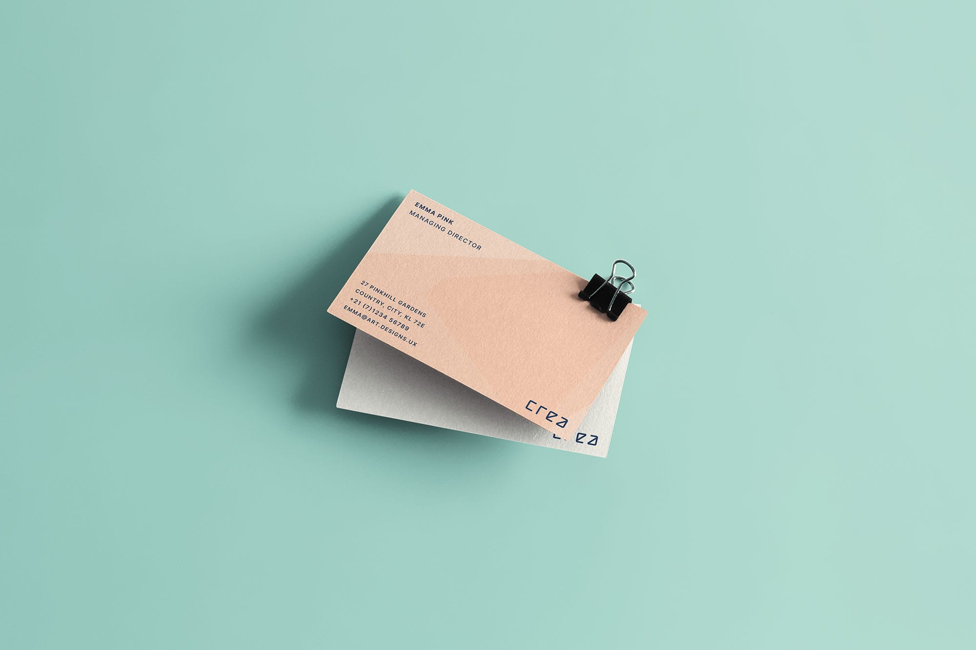 A free business card in binder clips mockup