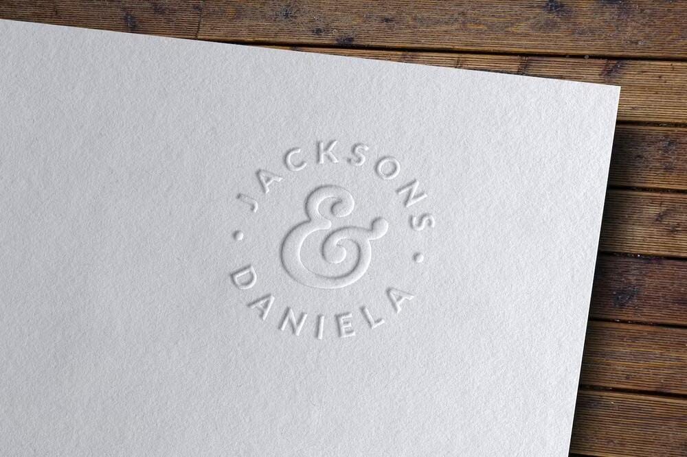 An embossed logo on white paper mockup