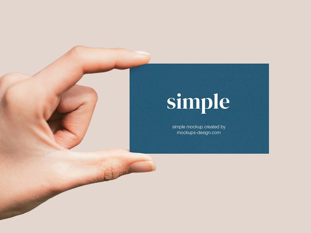 A free hand holding business card mockup