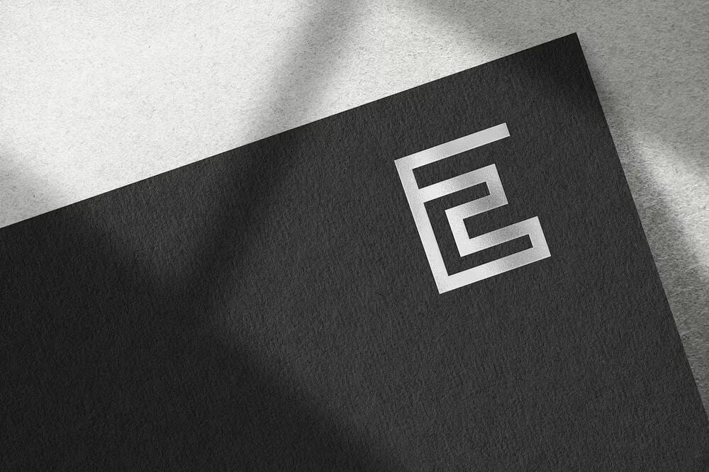 A silver embossed logo mockup